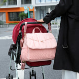 Pink waterproof padded nylon diaper bag with handles